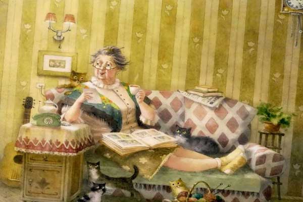 старая женщина на диване с котом картинка